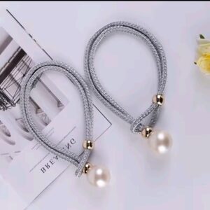 MAGNETIC TIE BACK CURTAIN HOLDERS.